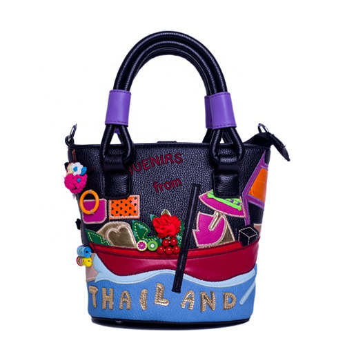 Lady's bucket new Korean version fashion impact color embroidery bag personalized handbag single shoulder sloping 
